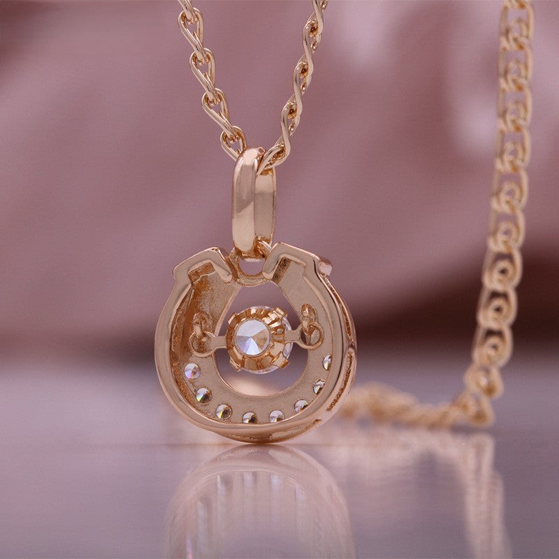 Halskette Hufeisen mit mikrobemaltem Zirkonanhänger in 585er Roségold, ein zarte3