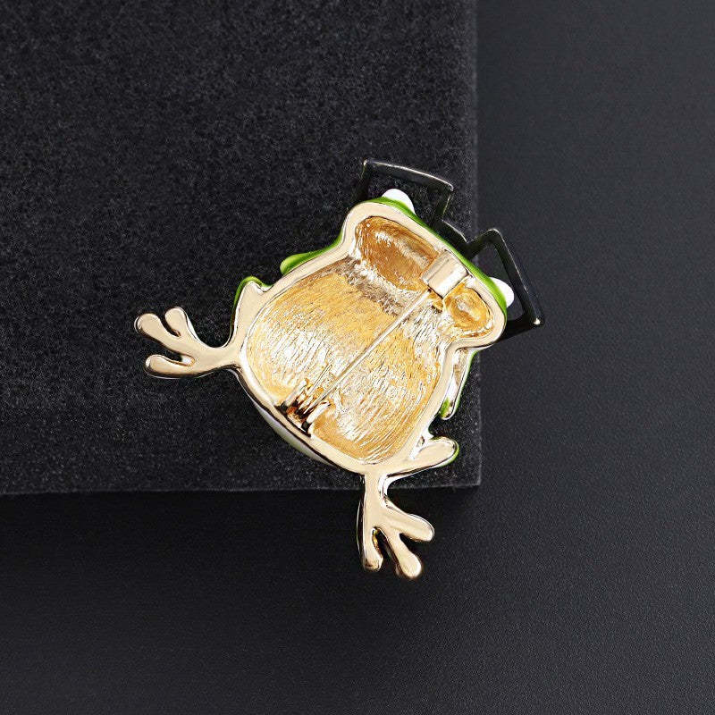 Niedliche Brosche mit öltropfendem Frosch und Brille, CartoonBrosche aus Legier9