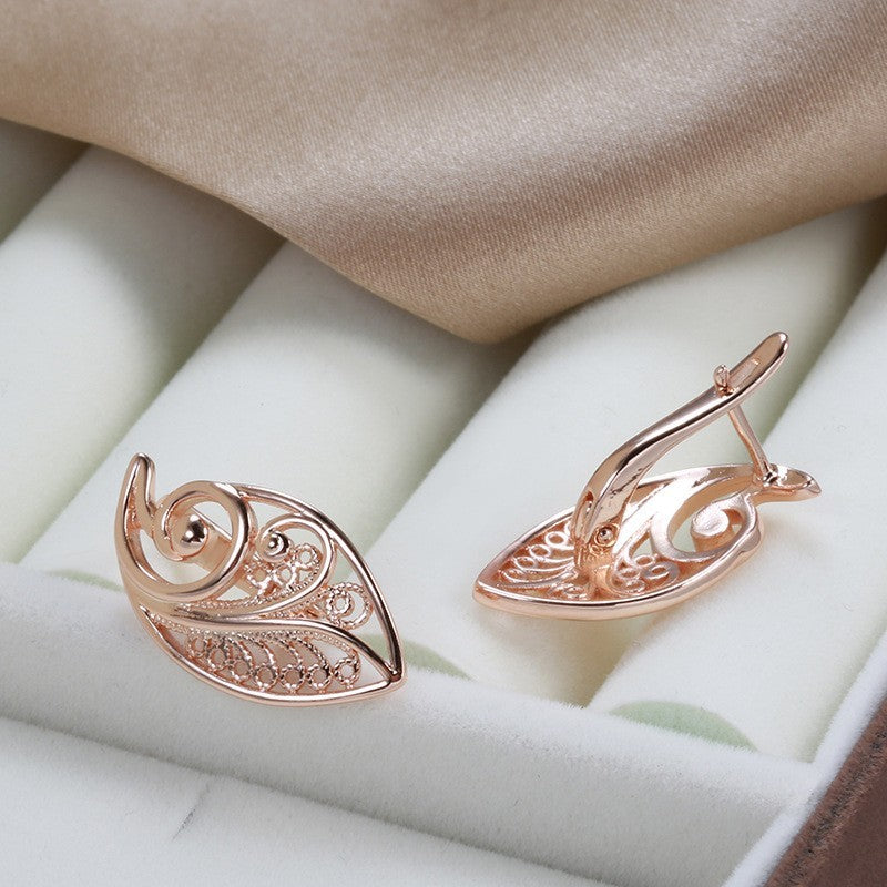 Luxus Damen Blatt Ohrringe 585 Roségold Ohrringe in kaltem Stil einfache hohle6