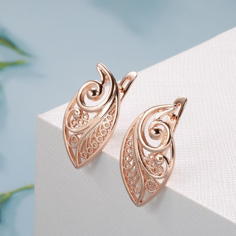 Luxus Damen Blatt Ohrringe 585 Roségold Ohrringe in kaltem Stil einfache hohle5