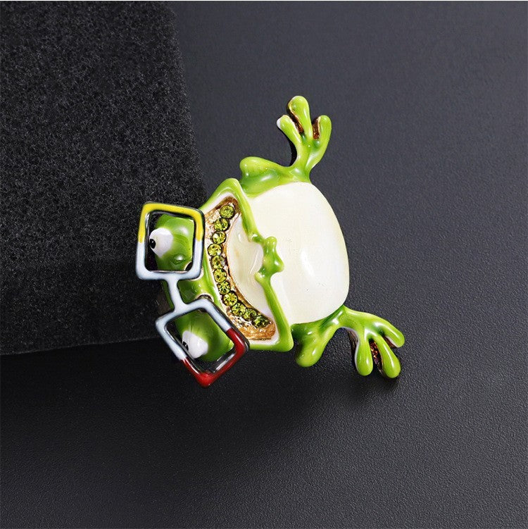 Niedliche Brosche mit öltropfendem Frosch und Brille, CartoonBrosche aus Legier3