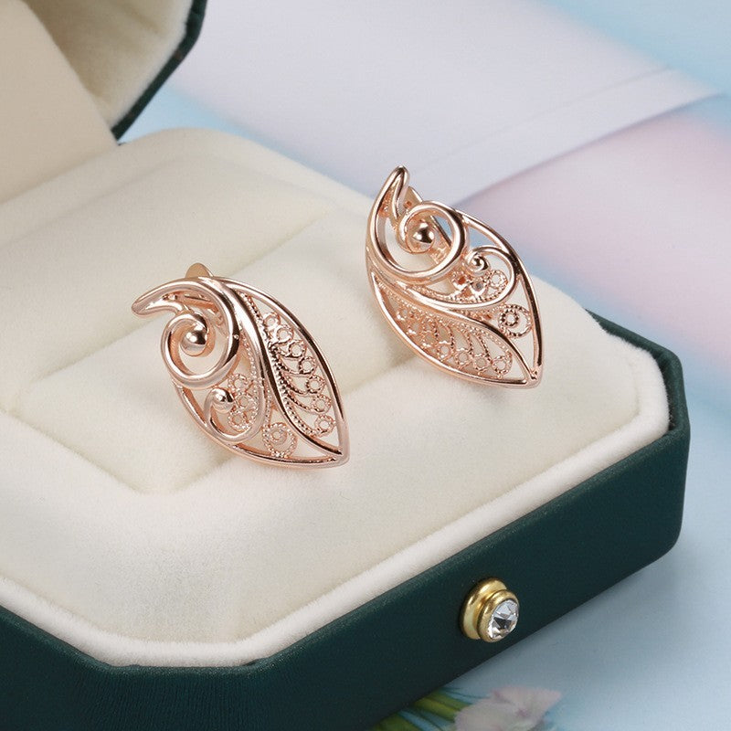 Luxus Damen Blatt Ohrringe 585 Roségold Ohrringe in kaltem Stil einfache hohle7