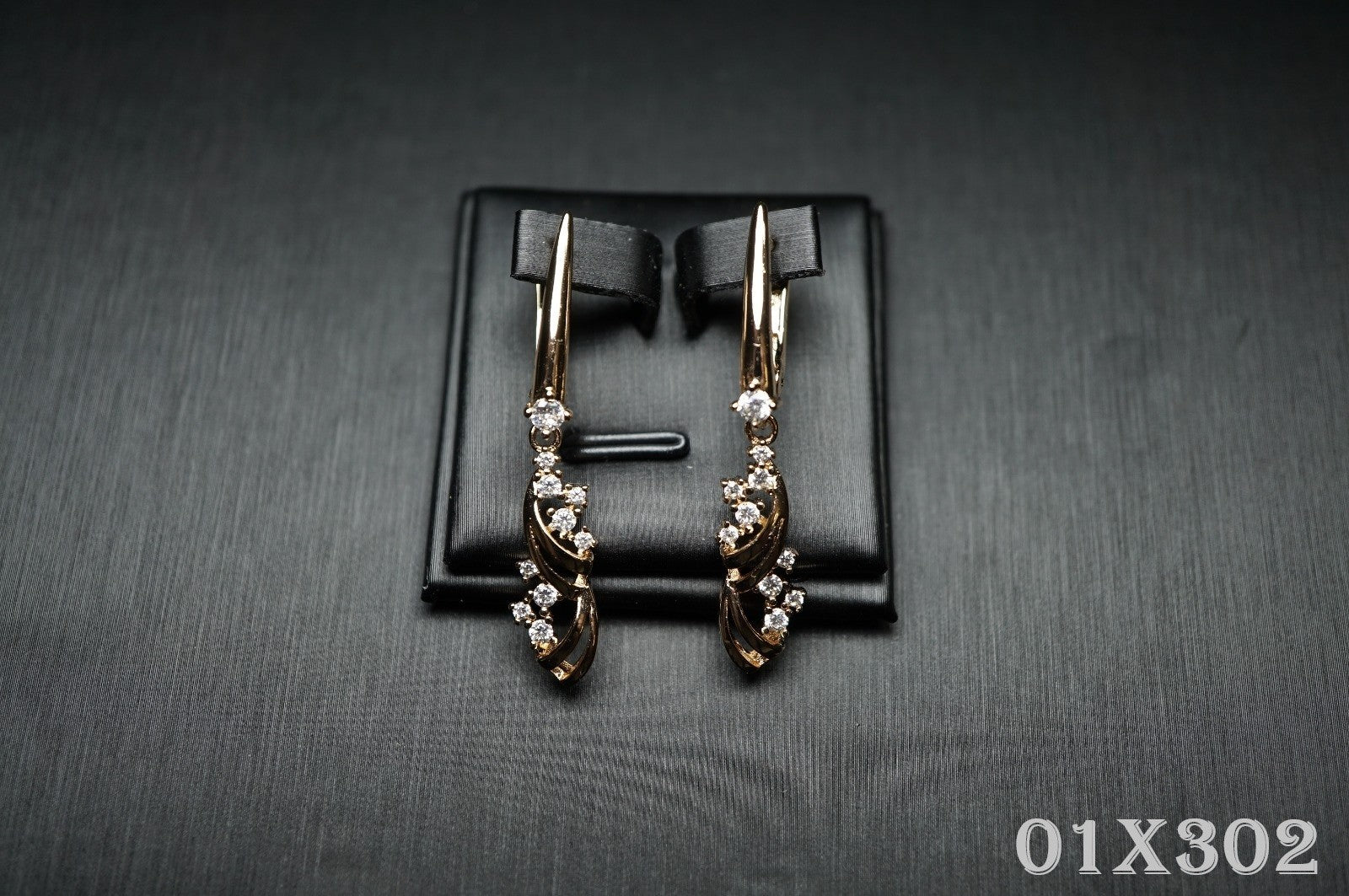 Damen Ohrringe Roségold (vergoldet) geschwungenen floralen ZirkoniaAkzenten – E14