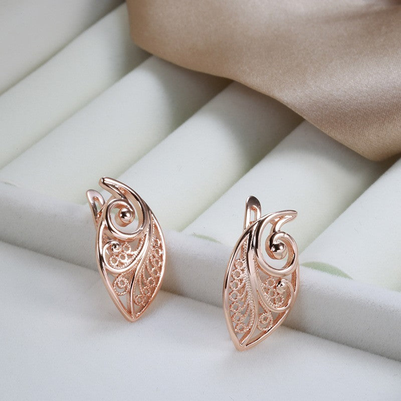 Luxus Damen Blatt Ohrringe 585 Roségold Ohrringe in kaltem Stil einfache hohle4
